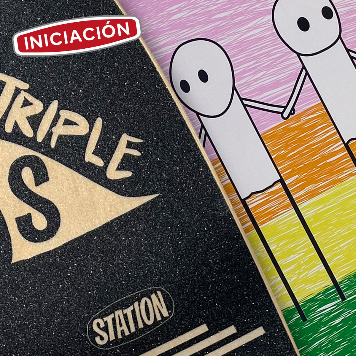 Detalle de lija y dibujo pequeños hombres sobre tabla de surfskate 32 pulgadas